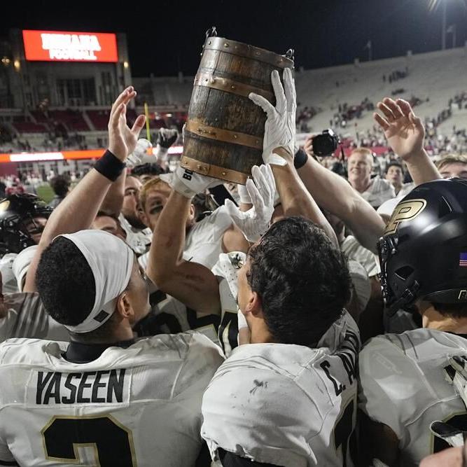 Purdue football team celebrates with the Old Oaken Bucket.jpeg